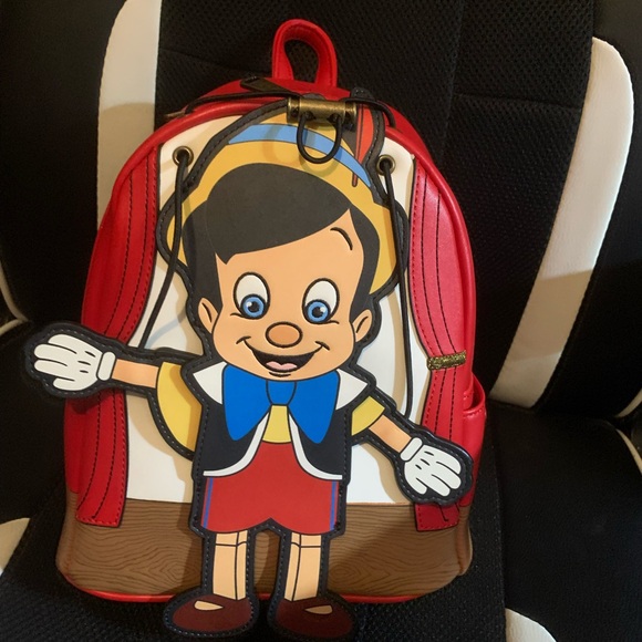 Pinocchio backpack with moving arms and matching loungefly wallet - Picture 2 of 16